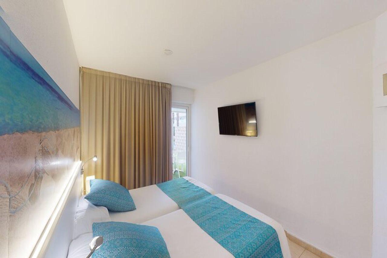Aparthotel Tropic Garden Santa Eularia des Riu Ngoại thất bức ảnh